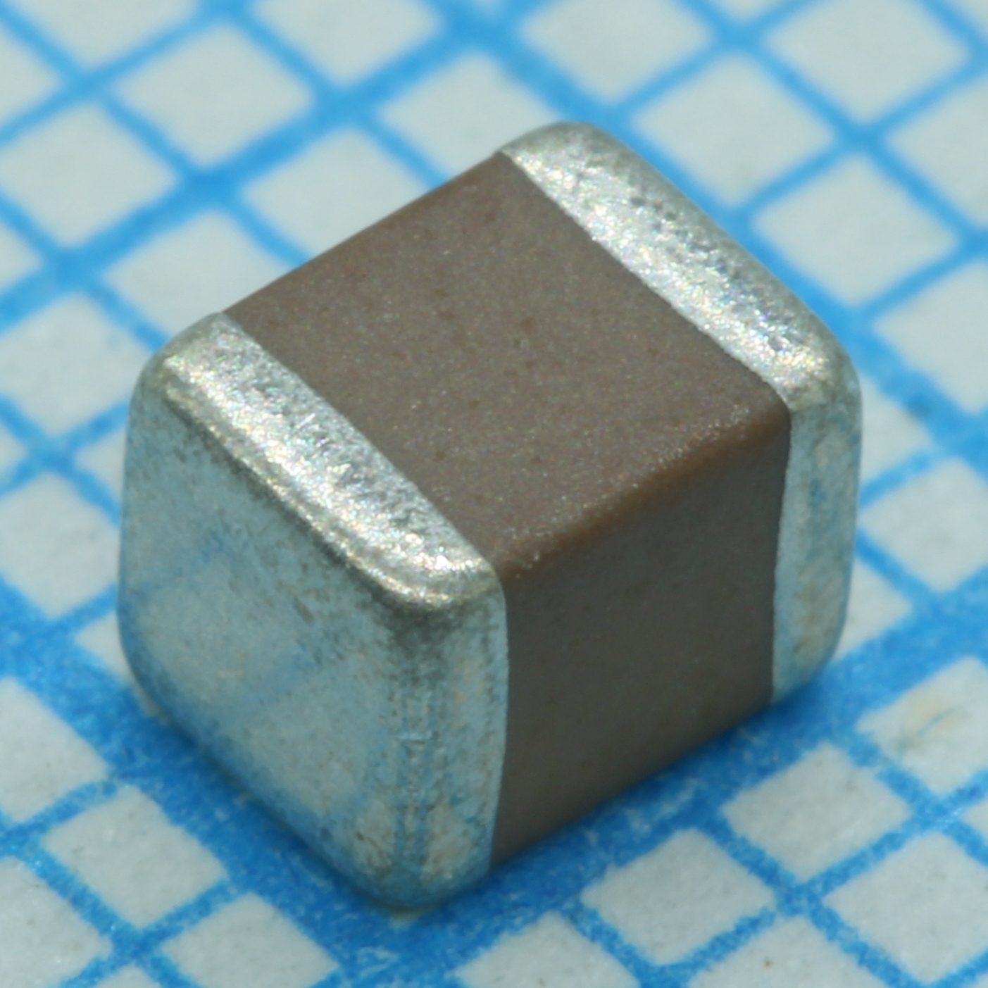 Фото ИП 1206  0.010uF X7R 500V 10% VISHAY — VJ1210Y103KXEAT — Конденсаторы керамические SMD — VISHAY